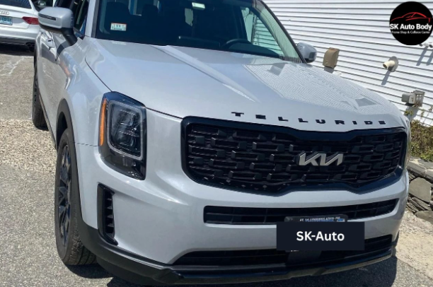 local auto body shop vs dealerships